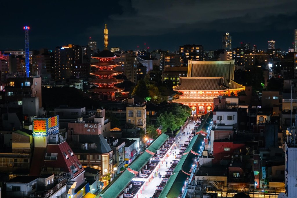 Asakusa at night from observation terrace with illuminated Senso-ji