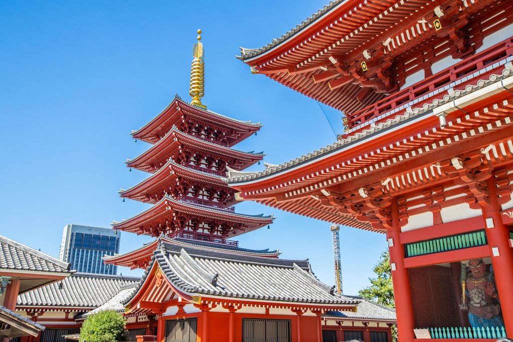 Families navigating Asakusa station and streets