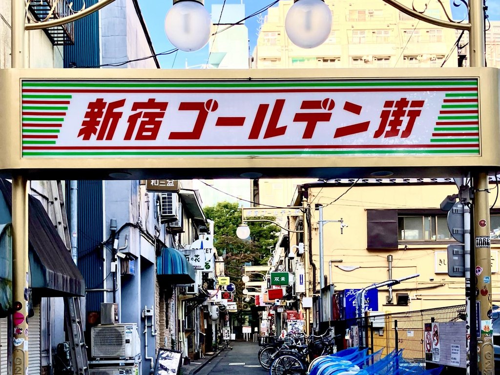 Narrow alley with tiny bars in Golden Gai at night