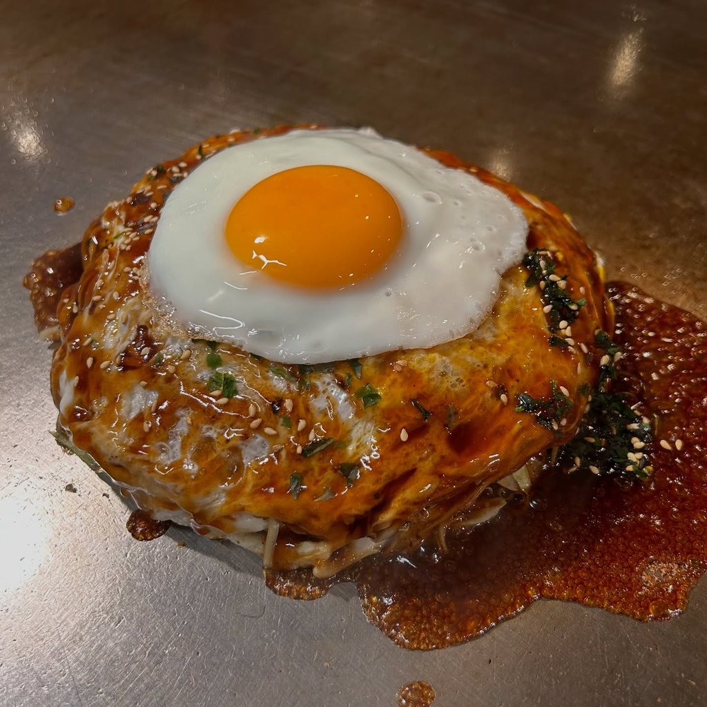 Okonomiyaki being prepared at Teppan Baby