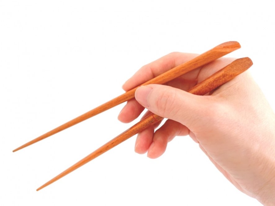 Correct chopstick grip technique demonstration