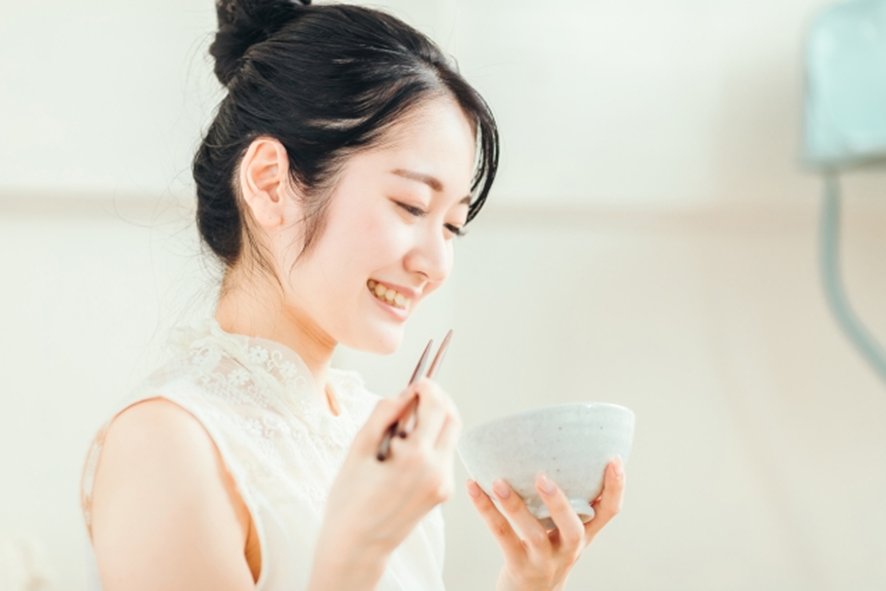 Japanese dining table with chopsticks and traditional meal