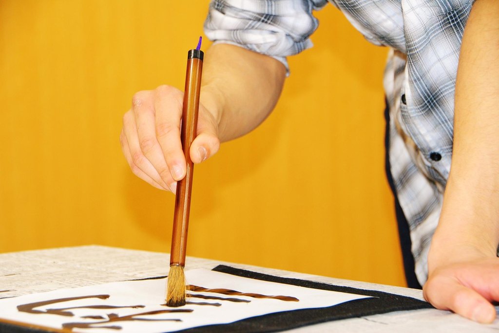 Completed Japanese calligraphy artwork on display