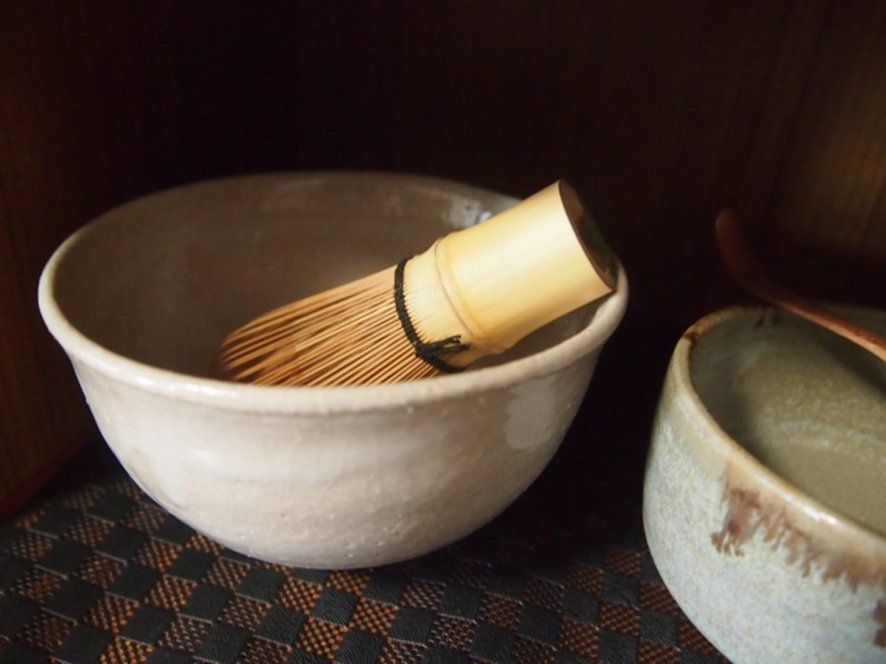 Whisking matcha with bamboo chasen in chawan
