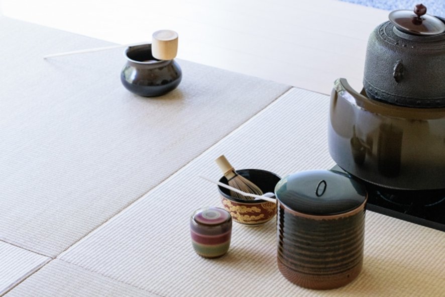 Historical scroll depicting traditional tea ceremony