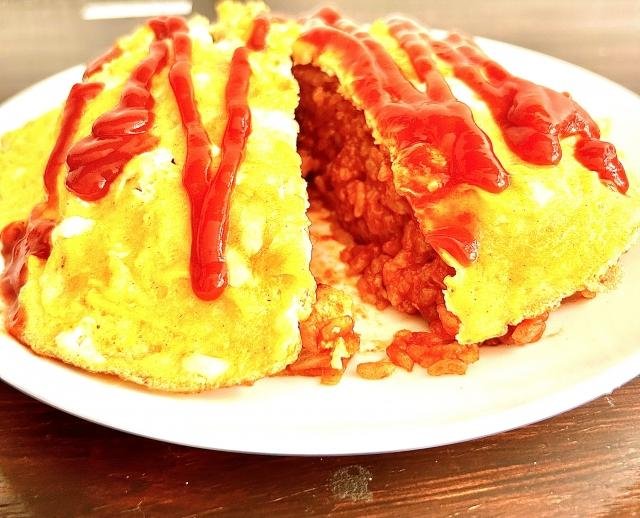 Soft-set omurice with runny egg in Tokyo