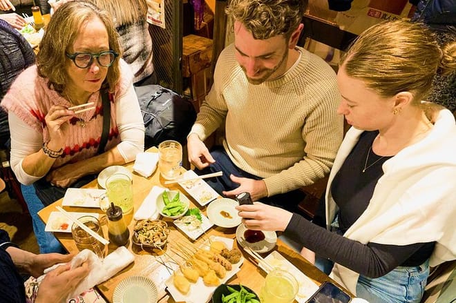 Osaka: Guided Food Tour with 12 Dishes at 4 Local Eateries
