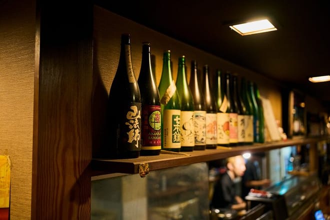 Osaka: Guided Food Tour with 12 Dishes at 4 Local Eateries