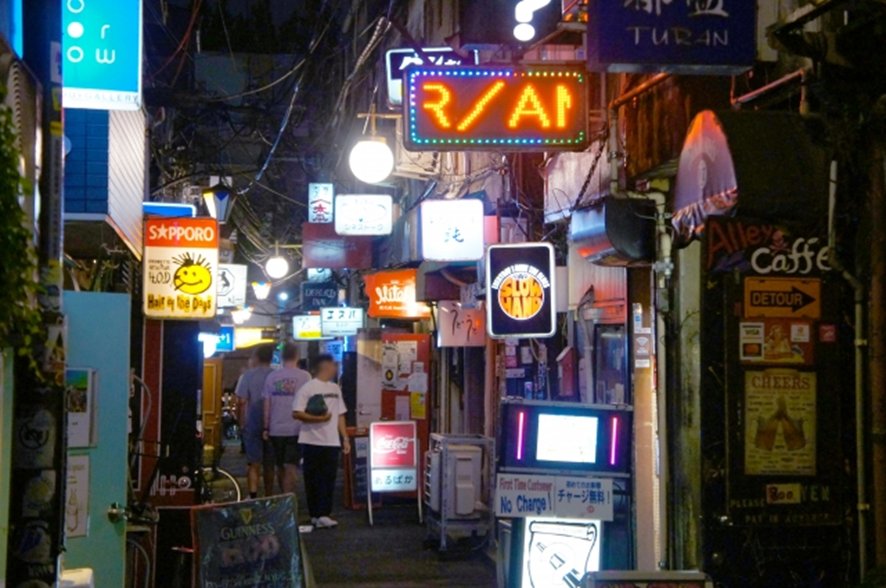 Narrow alley in Golden Gai with small bar entrances