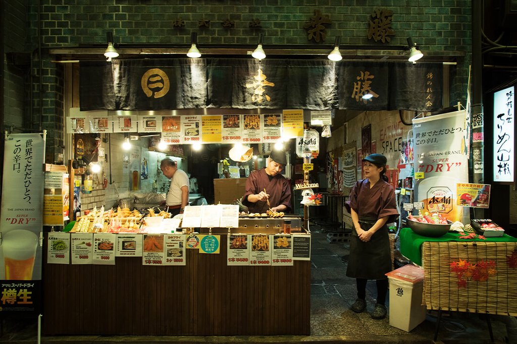 Street food stalls at Nishiki Market Kyoto