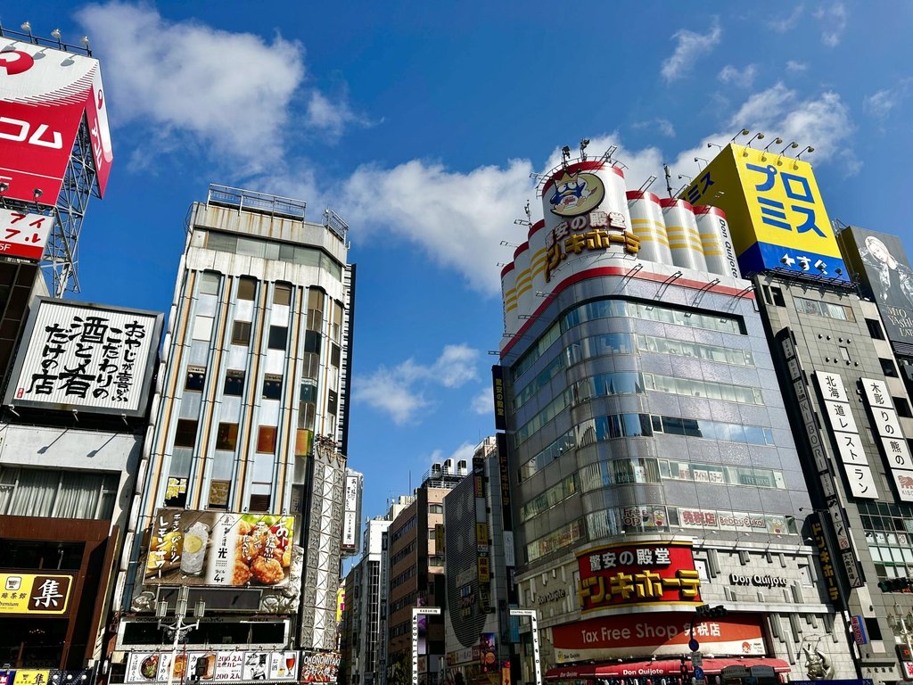 Shinjuku Station bustling with commuters in Tokyo