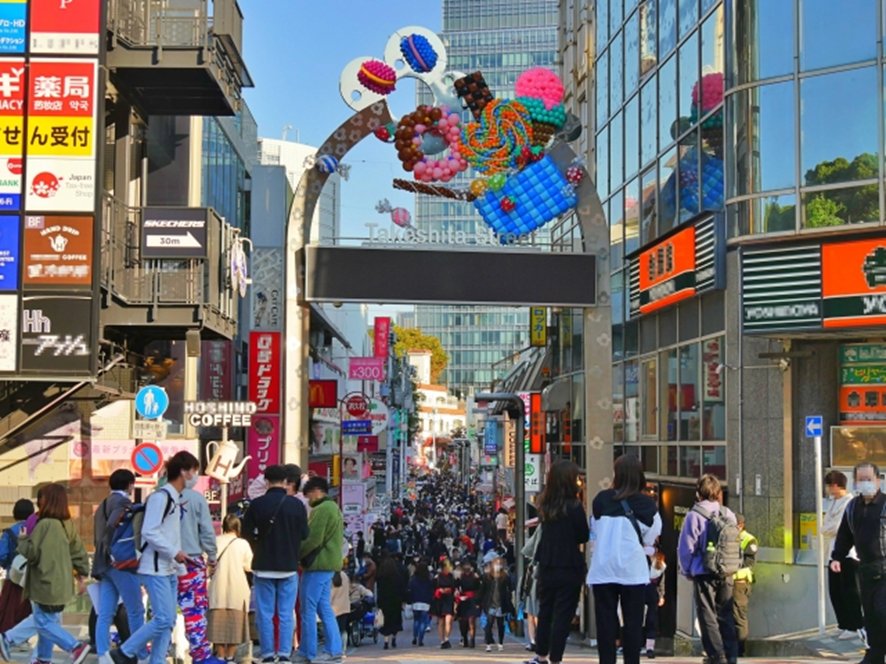 Takeshita-dori street with colorful crepes and sweets in Harajuku