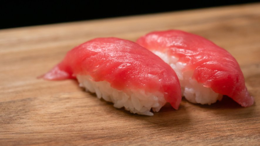 Fresh tuna sashimi with different cuts displayed