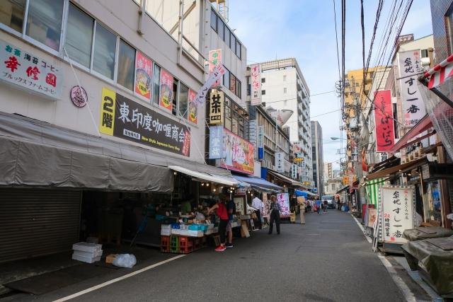 Various fresh seafood displayed at Tsukiji market stalls