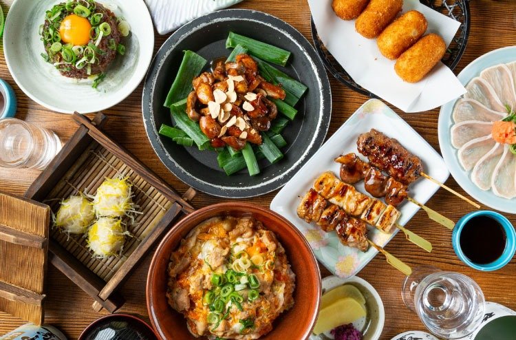 Yakitori and sake served at brewery restaurant in Kyoto
