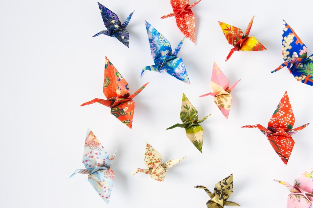 Traditional origami crane in red paper